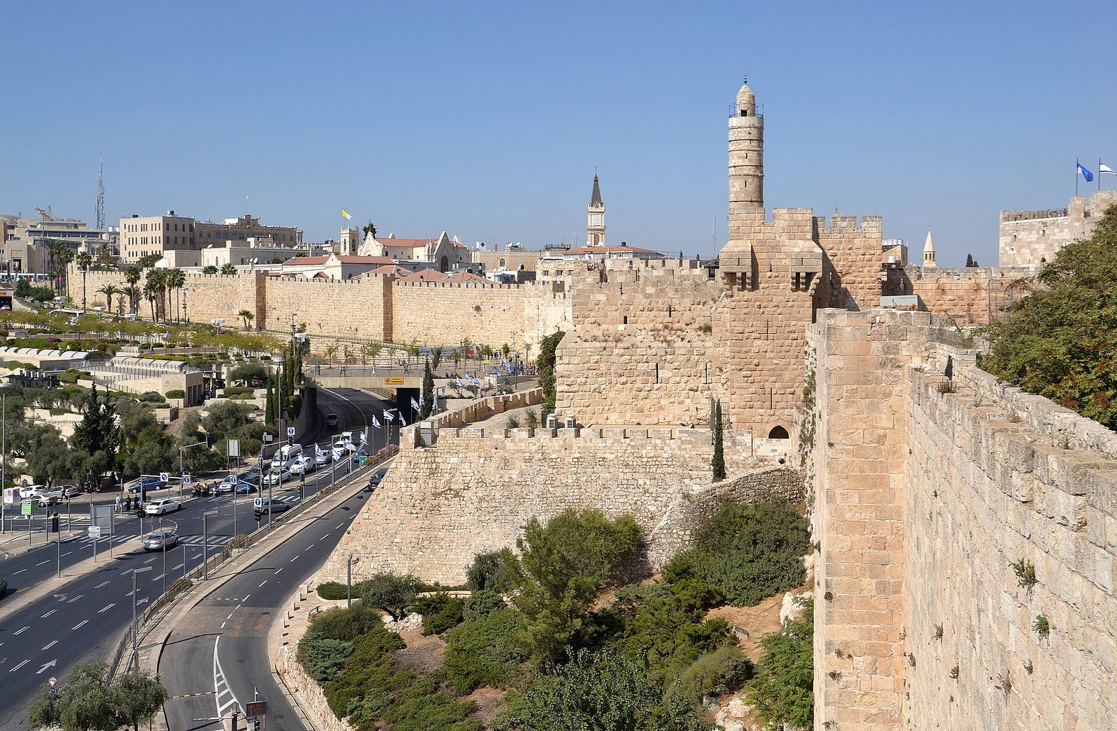 The Tower of David and the Old City walls of Jerusalem under a clear sky