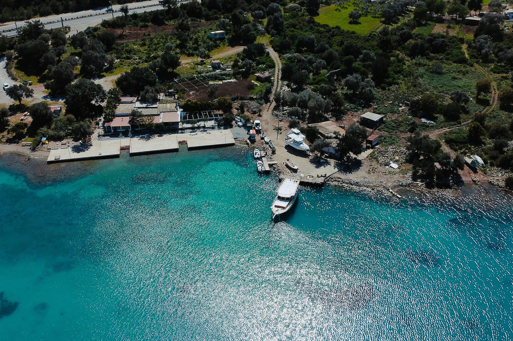 Turquoise water in a bay on the Bodrum peninsula from above
