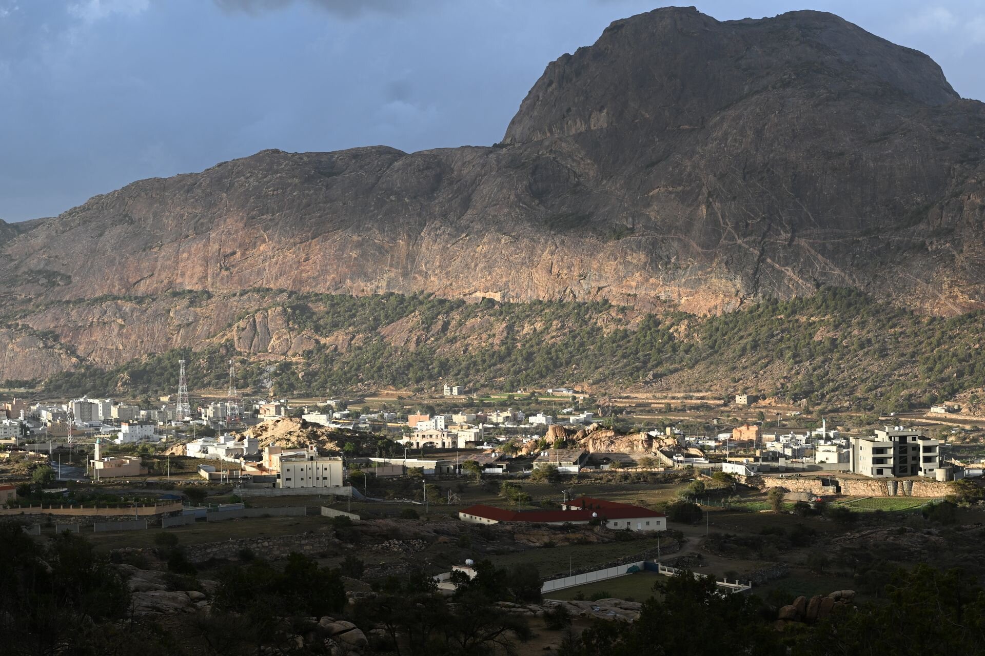 A mountain village below the granite peaks of the Asir highlands, Saudi Arabia