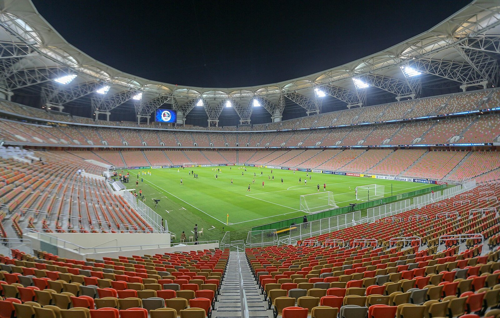 The floodlit bowl of the King Abdullah Sports City stadium, the Jewel, in Jeddah.