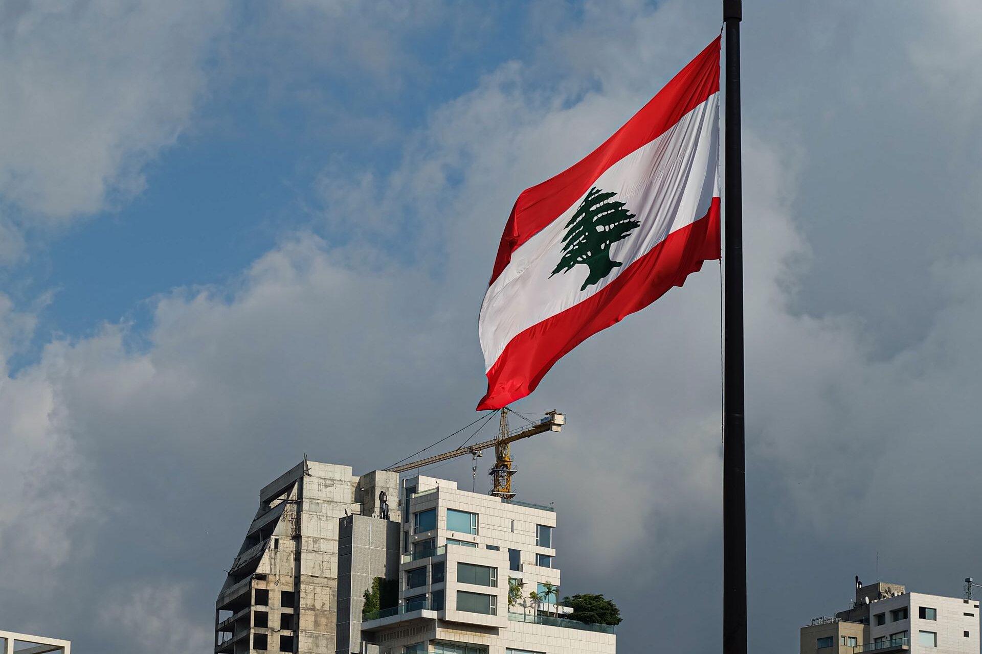 The Lebanese flag above new residential towers in Beirut