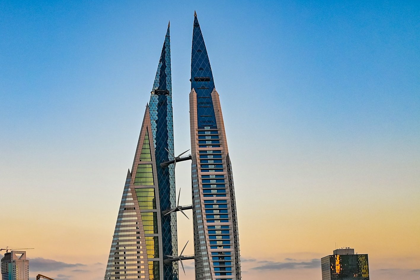 The Bahrain World Trade Center towers in Manama at sunset