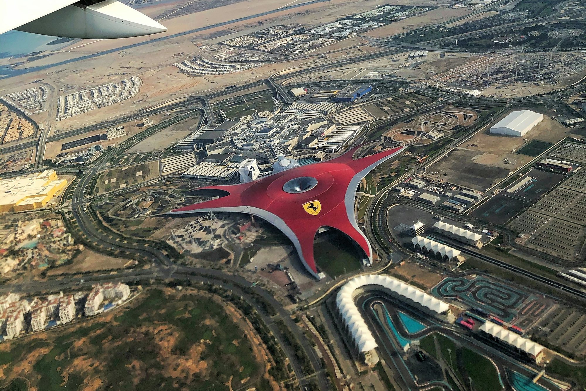 Ferrari World and the Yas Marina Circuit on Yas Island, Abu Dhabi, seen from the air