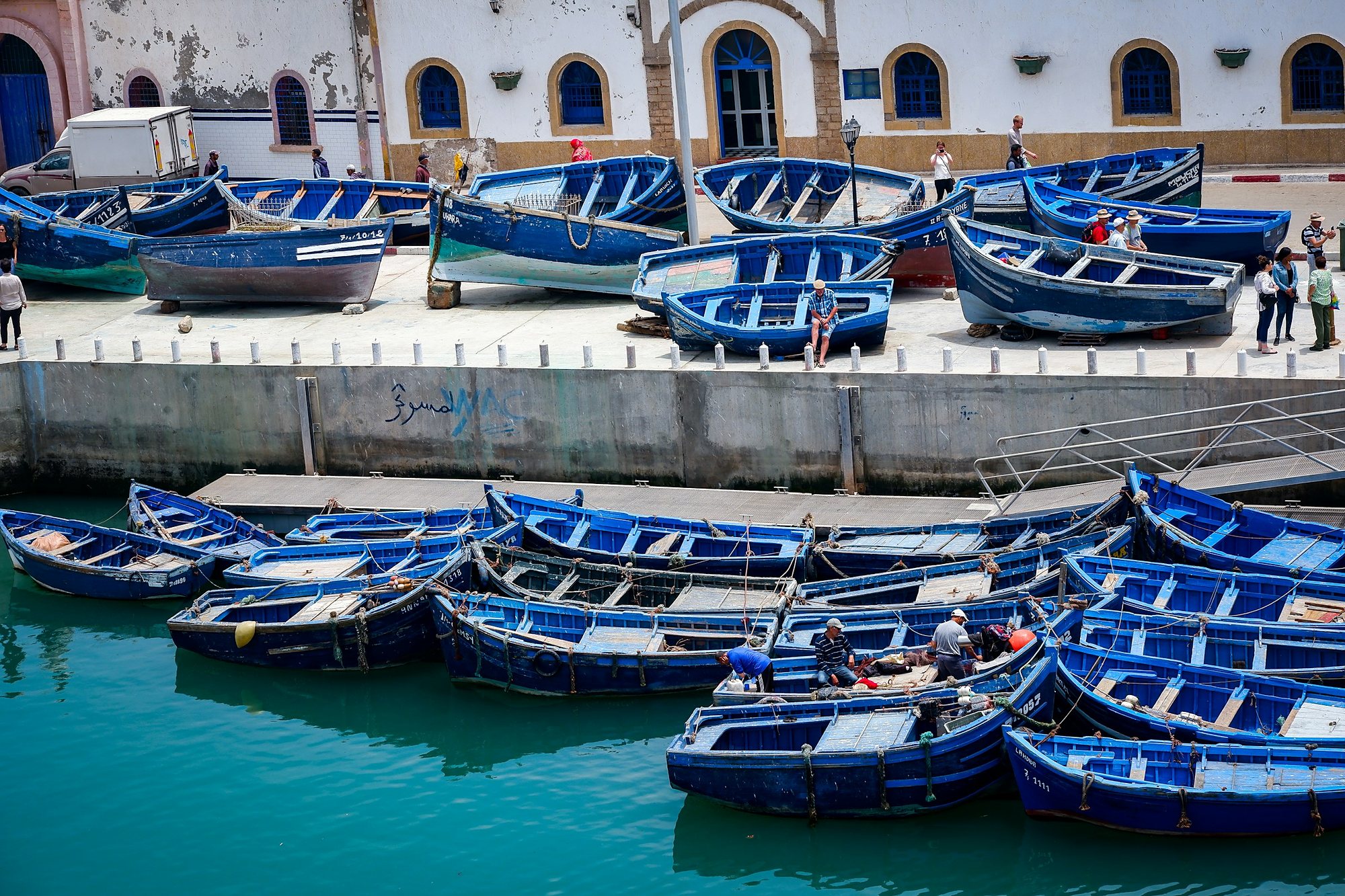 Blue fishing boats in the harbor of Essaouira