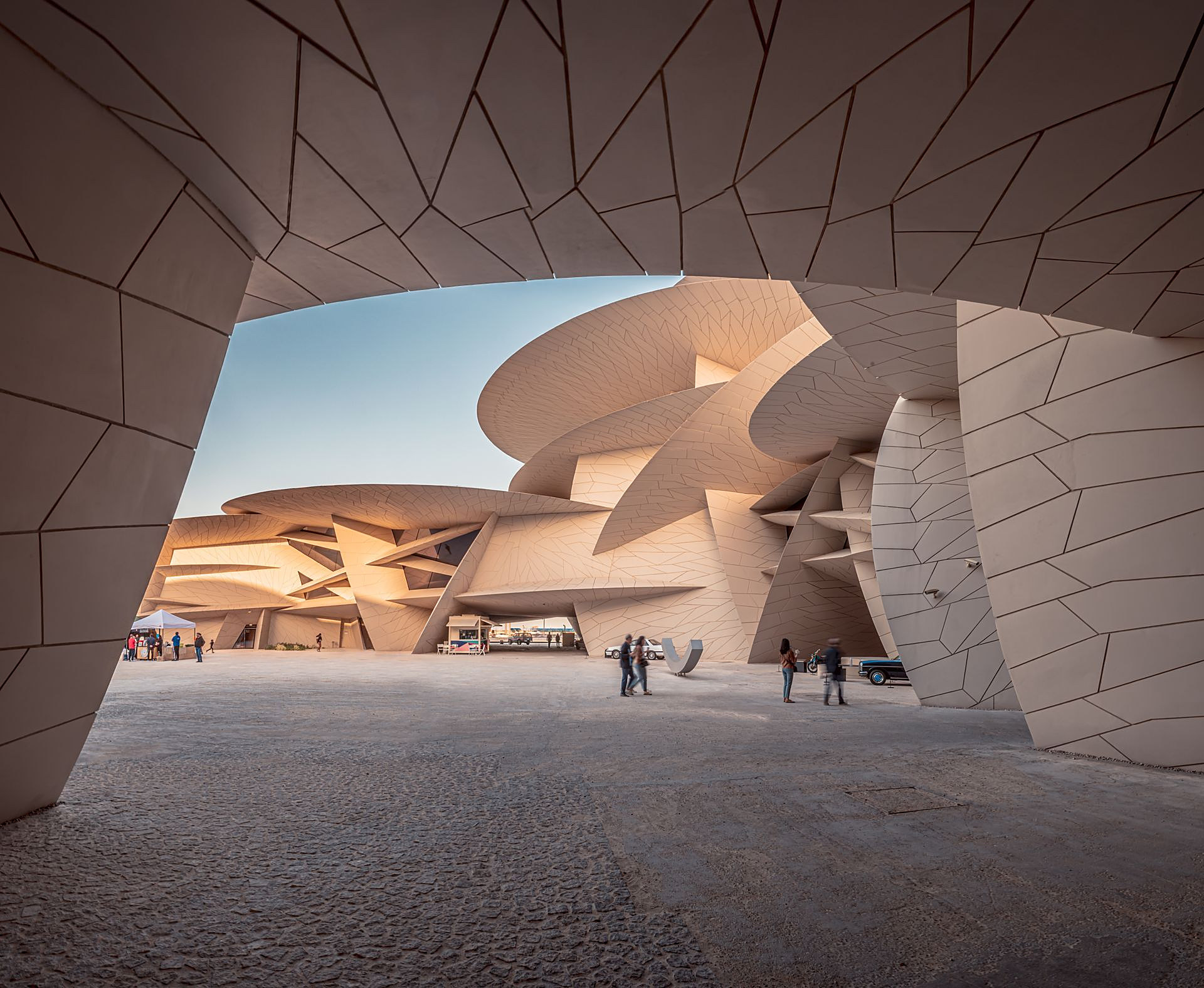 The interlocking discs of the National Museum of Qatar, inspired by the desert rose, in warm evening light
