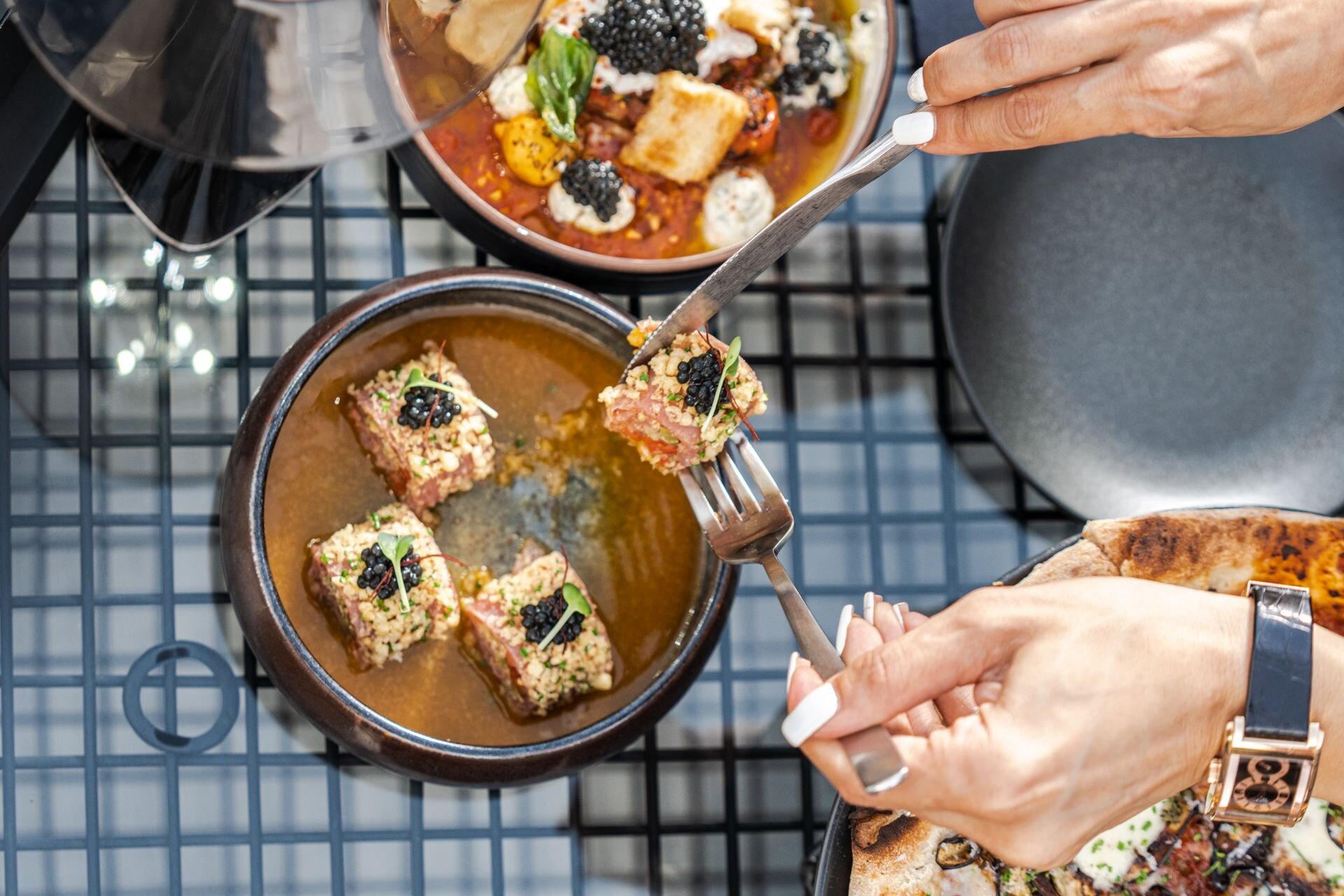 Fine dining in Dubai: seared tuna and caviar served at the table