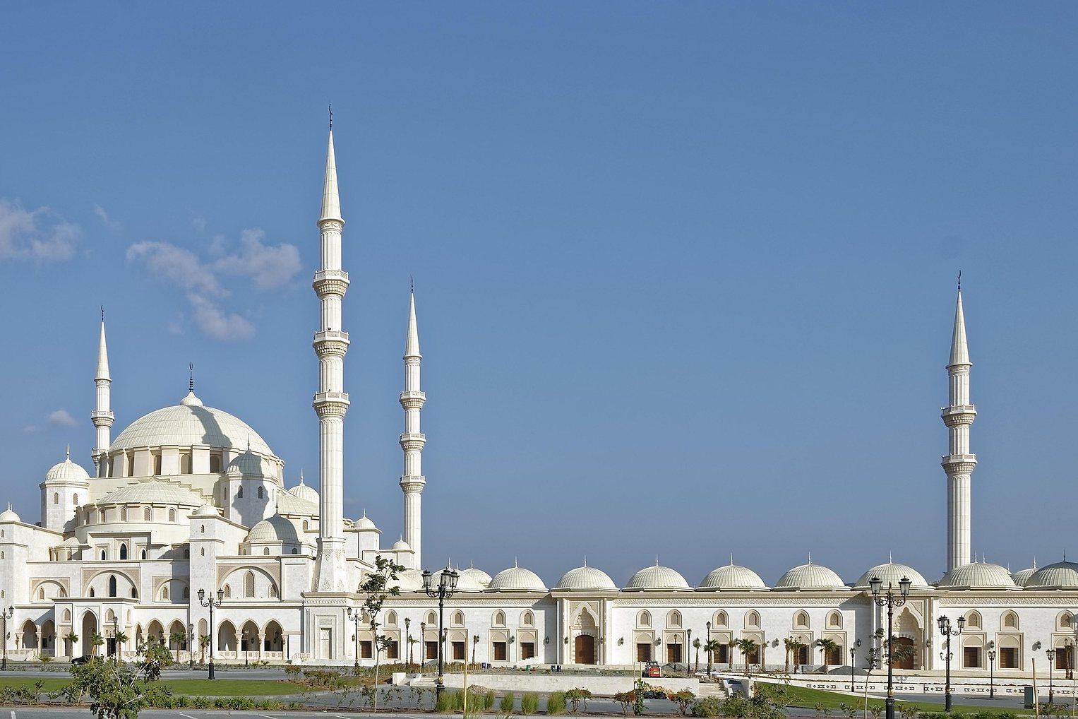The white domes and minarets of the Sheikh Zayed Mosque in Fujairah