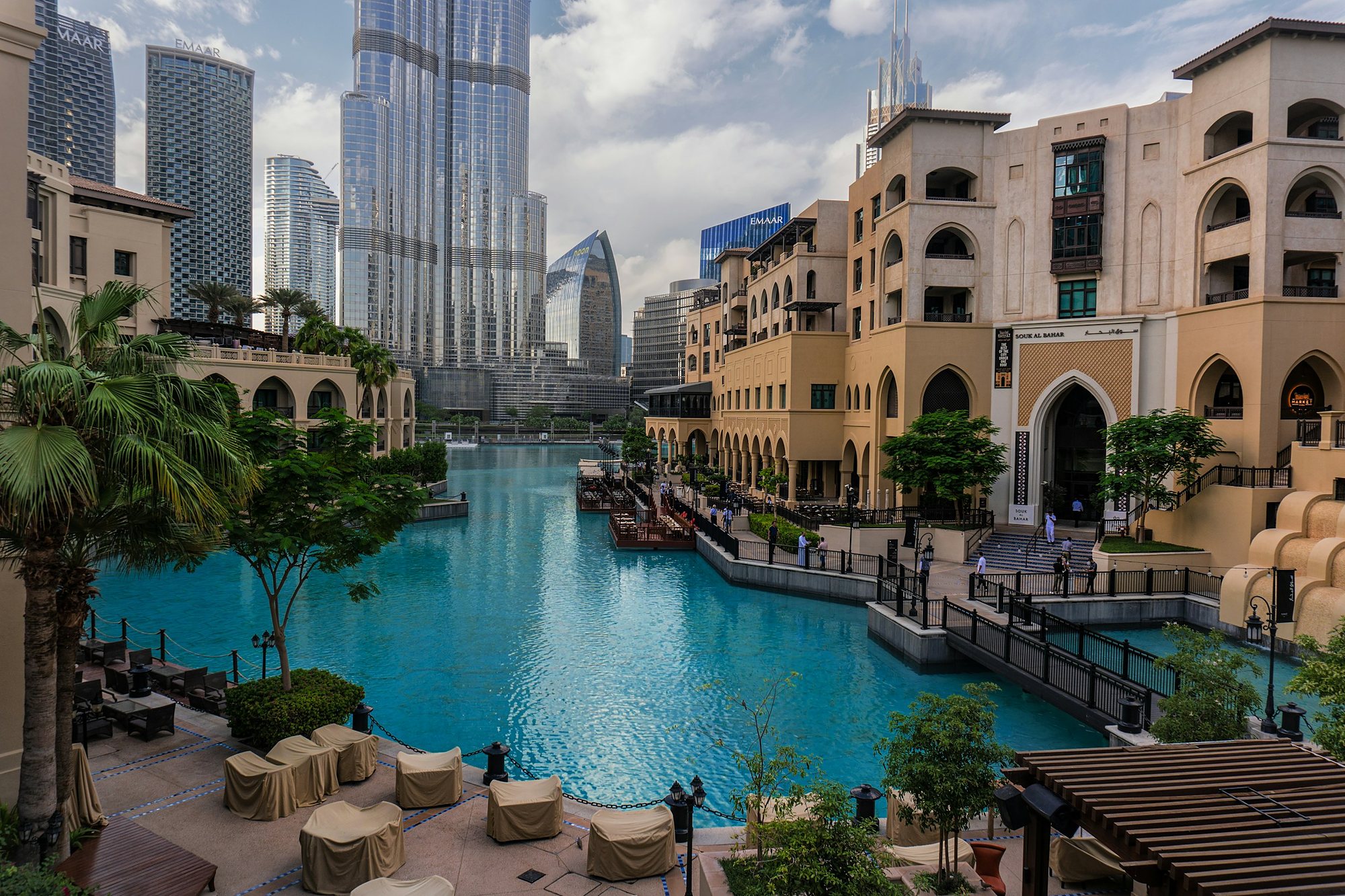 Souk Al Bahar and the hotels of Downtown Dubai around the lake below the Burj Khalifa