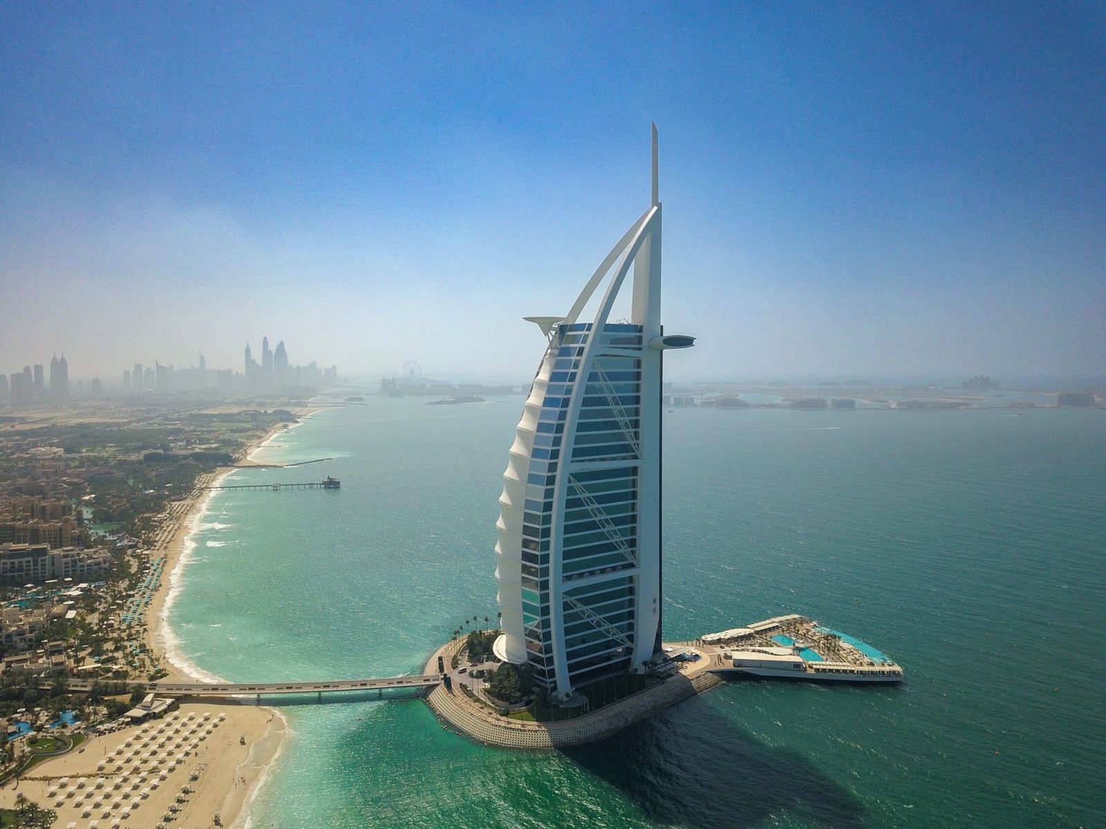 The Burj Al Arab, Jumeirah Beach and the marina seen from the air, Dubai